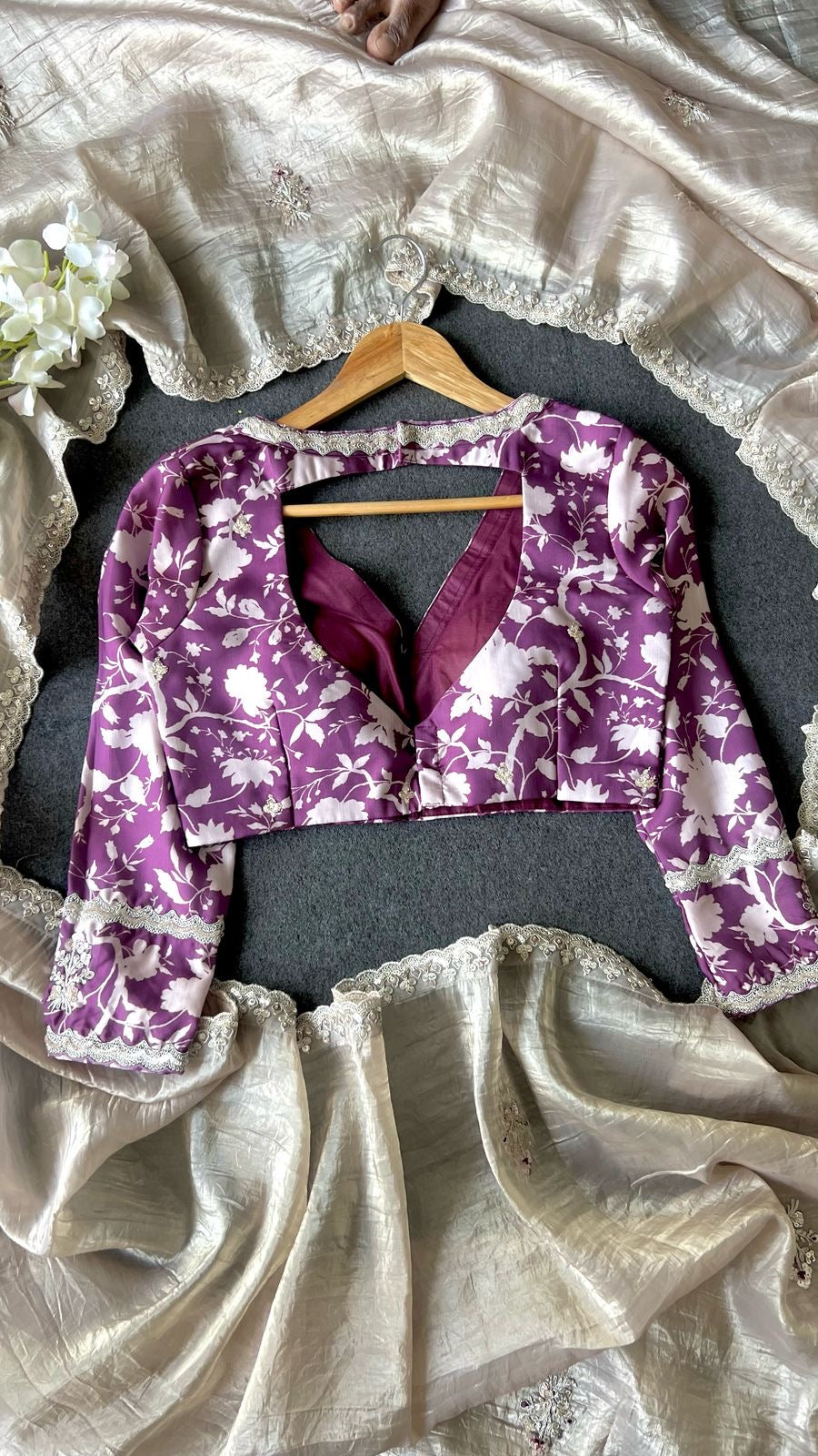 Cream soft tissue saree with wine floral embroidery blouse